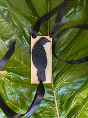 New handcrafted 3-dimensional Tui on swinging on durable double-sided silk satin ribbon.  Confident spiritual warrior, the Tui brings harmony and holds power as a messenger to the gods.   Pantone resin colour option: Cream base with Black Tui- Black Ribbon by Tania Tupu