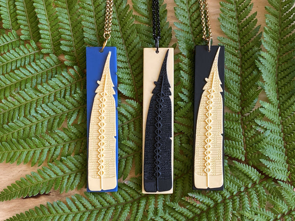 Shaped like the tukutuku panels that adorn the walls of our wharenui 97 (H) x 20 mm (W) x 5 mm (D) Handcrafted 3-dimensional resin pendant on 50cm Stainless chain.